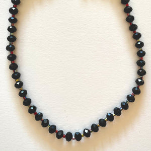 El collar de cristal negro