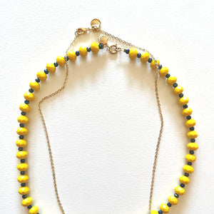 Conjunto collar de cristal amarillo y protección