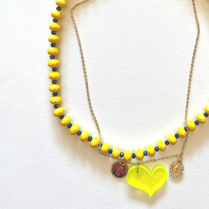 Conjunto collar de cristal amarillo y protección